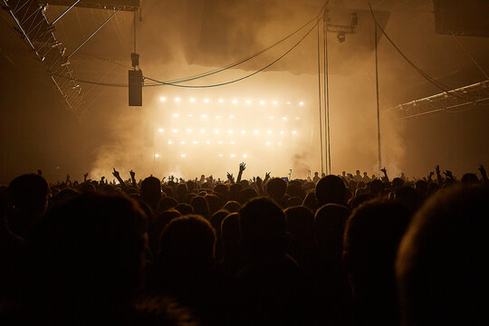 people dancing at an electronic music concert