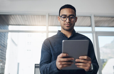 Email, research and a businessman with a tablet at work for connectivity and communication. Internet, reading and a corporate worker with an online app for a professional career as a lawyer in office