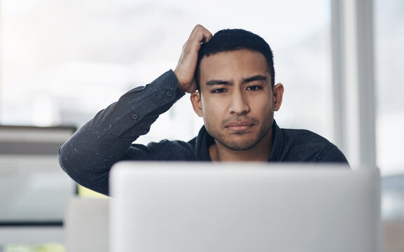 Business, confused and man with a laptop, stress and schedule with internet connection, thinking and online reading. Male person, employee and entrepreneur with a pc, anxiety and glitch with error
