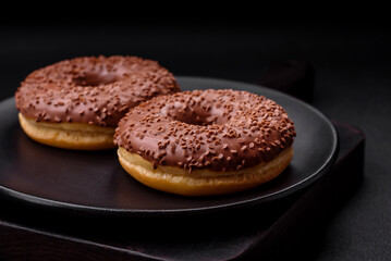 Delicious chocolate glazed donut sprinkled with chocolate chips