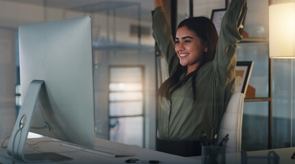 Night, business and woman with achievement, celebration and cheering with internet connection, happiness and joyful. Female person, employee and agent with a smile, computer and success with an email