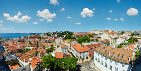 Fototapeta na wymiar Sea view and cityscape from roof. Lisbon, Portugal.