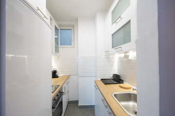 Small kitchen interior with appliances