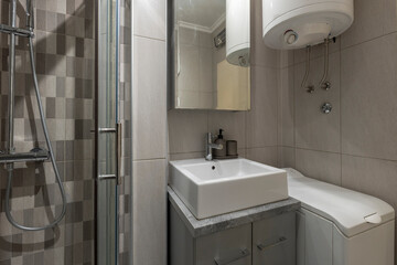 Bathroom interior with glass shower cabin
