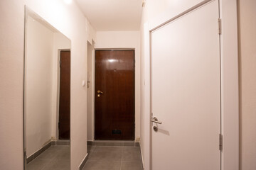 Entrance area with wooden doors