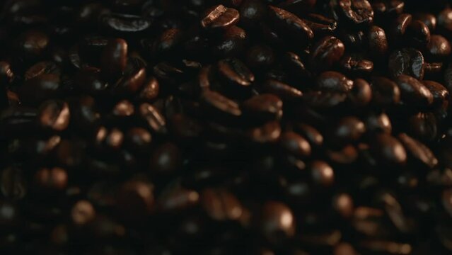 Coffee Beans Rolling Down, Slow Motion. Shot with ARRI Alexa in ArriRaw at 120 fps and exported 23.98 fps, QuickTime Apple ProRes 422 HQ.