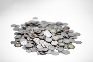 Ghanaian currency Coins Spread Out on a White Background