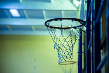 Fototapeta na wymiar basketball hoop in the gym close-up