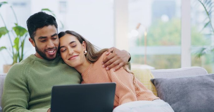 Hug, love and couple on couch, laptop and conversation at home, living room and conversation. Partners, man and woman on a sofa, kiss or technology in lounge, streaming movies or films with happiness