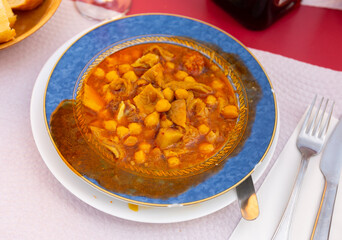 Beautifully served dish of callos a la madrilena with chickpeas and chorizo