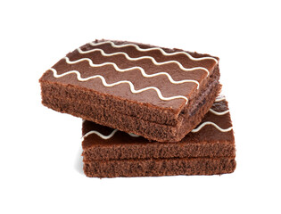 Delicious chocolate sponge cakes isolated on white