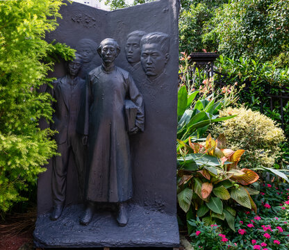 Shanghai, China - October 4, 2019:  Statue of Ruo Shi, famous left-wing Chinese writer, on Duolun Road, a pedestrian and cultural celebrity street in Hongkou District, Shanghai.