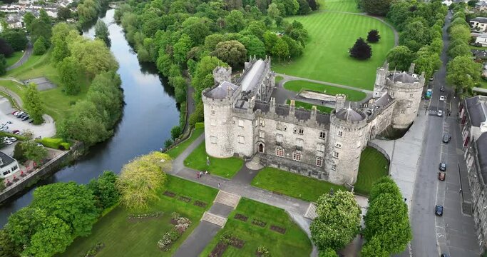 4k A flight towards Kilkenny Castle, through the green parkland of Ireland.
