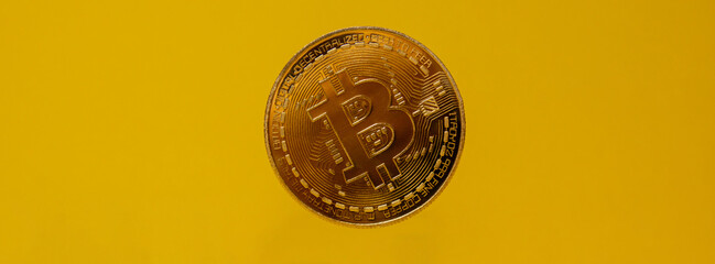 Bitcoin gold coin levitation with shadow reflection. Bitcoin flying mining trading concept. BTC golden money. Worldwide virtual internet Cryptocurrency or crypto digital payment system. Digital coin