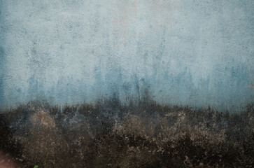 Blue to black grunge wall. this represent dualities or opposition: t may symbolize the interplay between light and darkness, or the coexistence of different aspects within a situation.