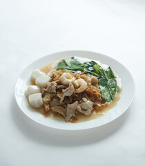 Penang famous hawker food Char Hor Fun. It is a stir fried flat rice noodles with treacly gravy.