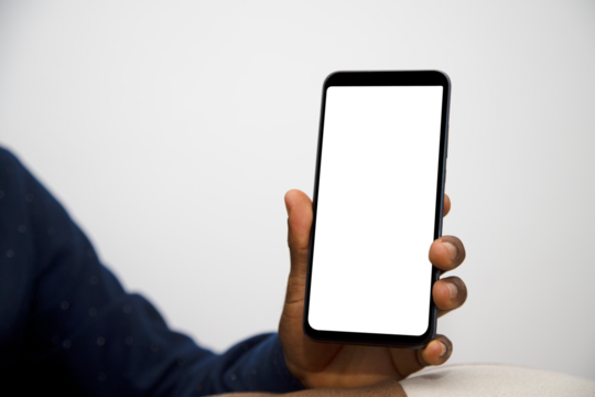 Black hand holding phone with transparent screen facing camera. blank screen, phone screen mockup, front view, clipping path, clipping mask