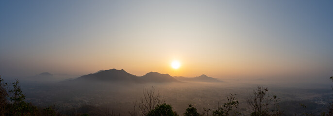 Mountain and fog with sunrise panorama at Phu Thok Chiang Khan Thailand.