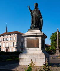 Fototapeta na wymiar View of monument of Gerbert of Aurillac, ancient scholar, teacher and first French-borned pope Sylvester II in Aurillac town on sunny day, France