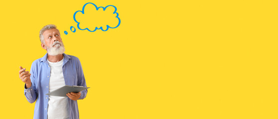 Thoughtful mature man with pen, clipboard and blank speech bubble on yellow background with space for text