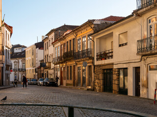 Naklejka na ściany i meble Picturesque view of old houses and streets of Vila Real town at sunny spring morning, Portugal