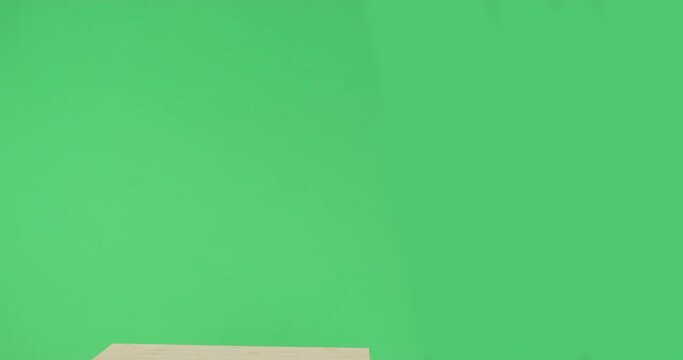 Dog in blue T-shirt at school desk looks around in embarrassment, confusion, first grader has difficulty concentrating. Fidget student looking back at exam, adhd, clip thinking, attention deficit