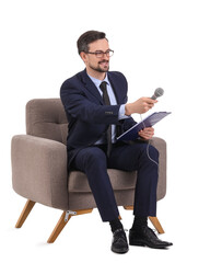 Male journalist with microphone and clipboard in armchair on white background