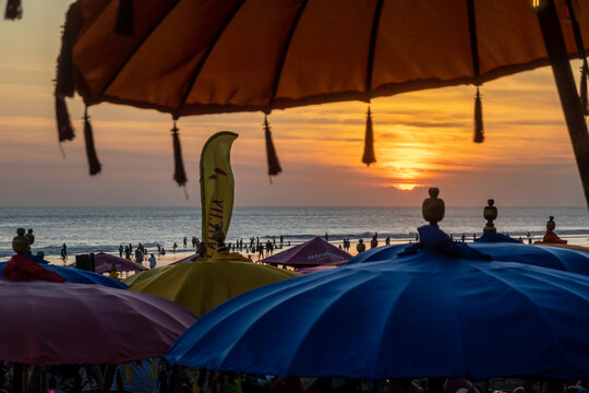 Seminyak, Bali, Indonesia The busy and teeming Seminyak Beach in the later aftenoon.
