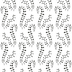 Monochrome seamless pattern with black leaves silhouettes on white background