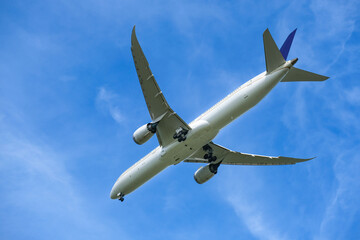 Passenger planes flying in the sky preparing to land at the airport airplane travel and international travel concept