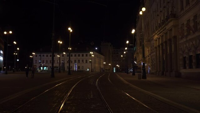 "Illuminated dark street in the center of Prague. 2023