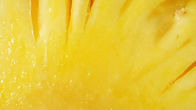 Inside a pineapple, exploring its intricate details up close through the lens of a macro probe lens. This unique perspective allows for a captivating journey into the heart of this tropical fruit. 4K
