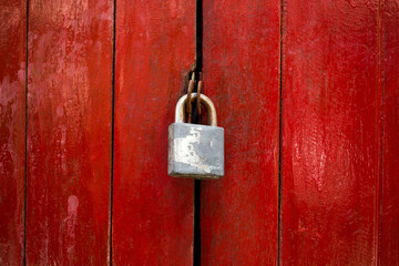 Old wooden red door lock