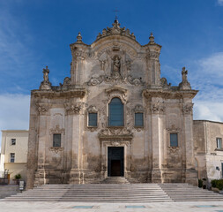 Fototapeta na wymiar Matera, Italy. View of the facades of the churches of Matera. Landscape of the historical part of the town. An Unesco World Heritage Site. Touristic destination