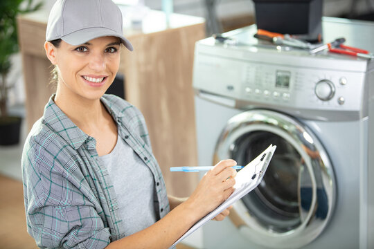 female tech washing machine repair service