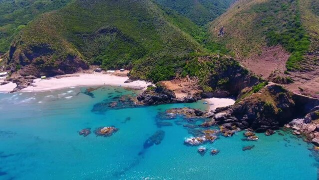 small beach in a heavenly cove of fine white sand between two mountains in jijel algeria