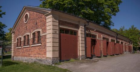 Old brick garage in the island Skeppsholmen, a sunny summer day in Stockholm