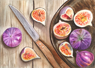 figs with a knife on a wooden table