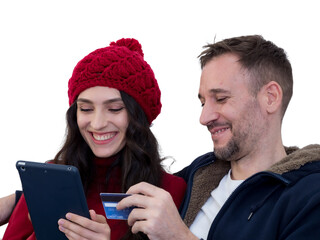 Couple using credit card to shop online