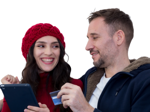 Couple using credit card to shop online