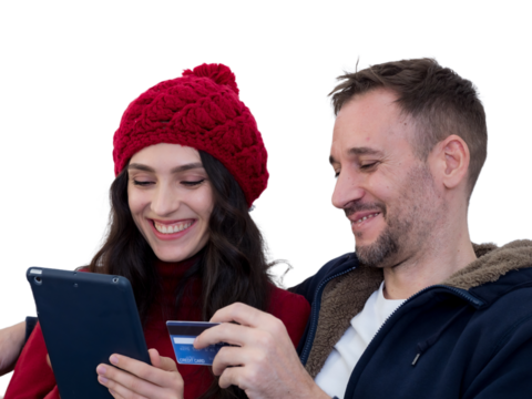 Couple using credit card to shop online