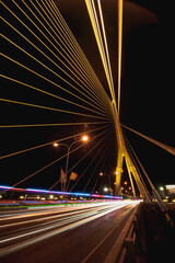 Fototapeta na wymiar Long exposure night land scape at rama VIII bridge, the famous suspension bridge in Thailand , Bangkok, Thailand
