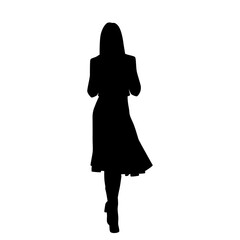 Vector silhouette of a young attractive slim woman in spring or autumn clothes walking, black color, isolated on a white background