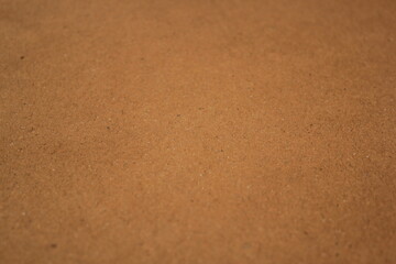 Brown paper texture close detailed background, shiny brown paper surface