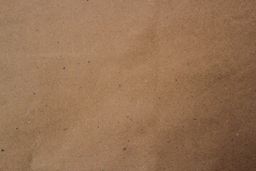 Brown paper texture close detailed background, shiny brown paper surface