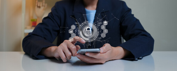 Cybersecurity technology concept. A person is using a smartphone with privacy protection. Application software critical systems Use on the Internet Stay away from digital threats.