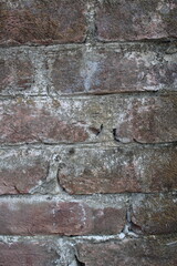 Weathered brick layer wall background, grungy brick texture surface, aged wall texture