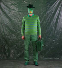 green alien on a green background