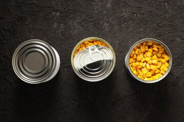 Canned food in blank metal jars, concept of canned food