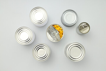 Canned food in blank metal jars, concept of canned food